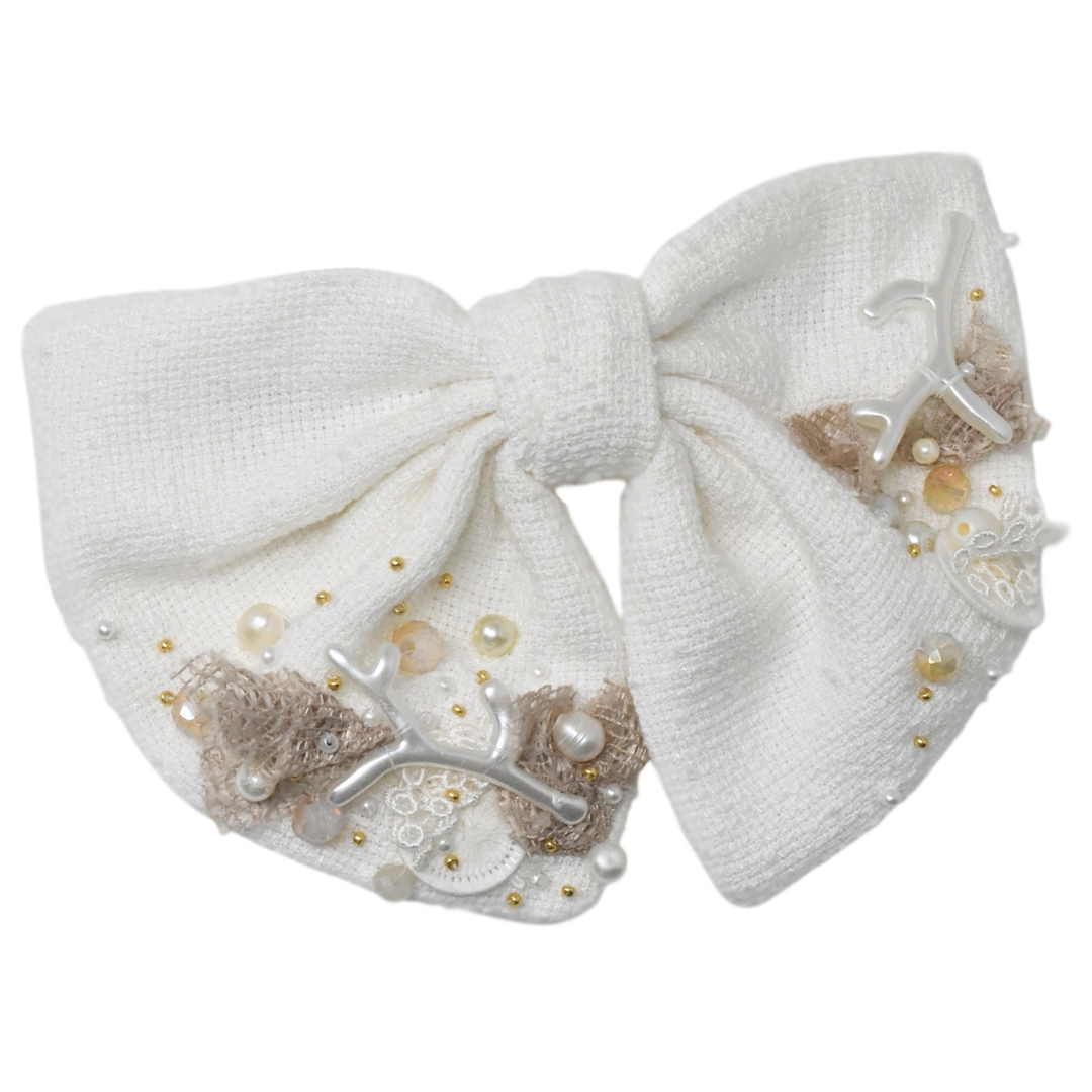 "Palm & Pearl: Midi Bow"