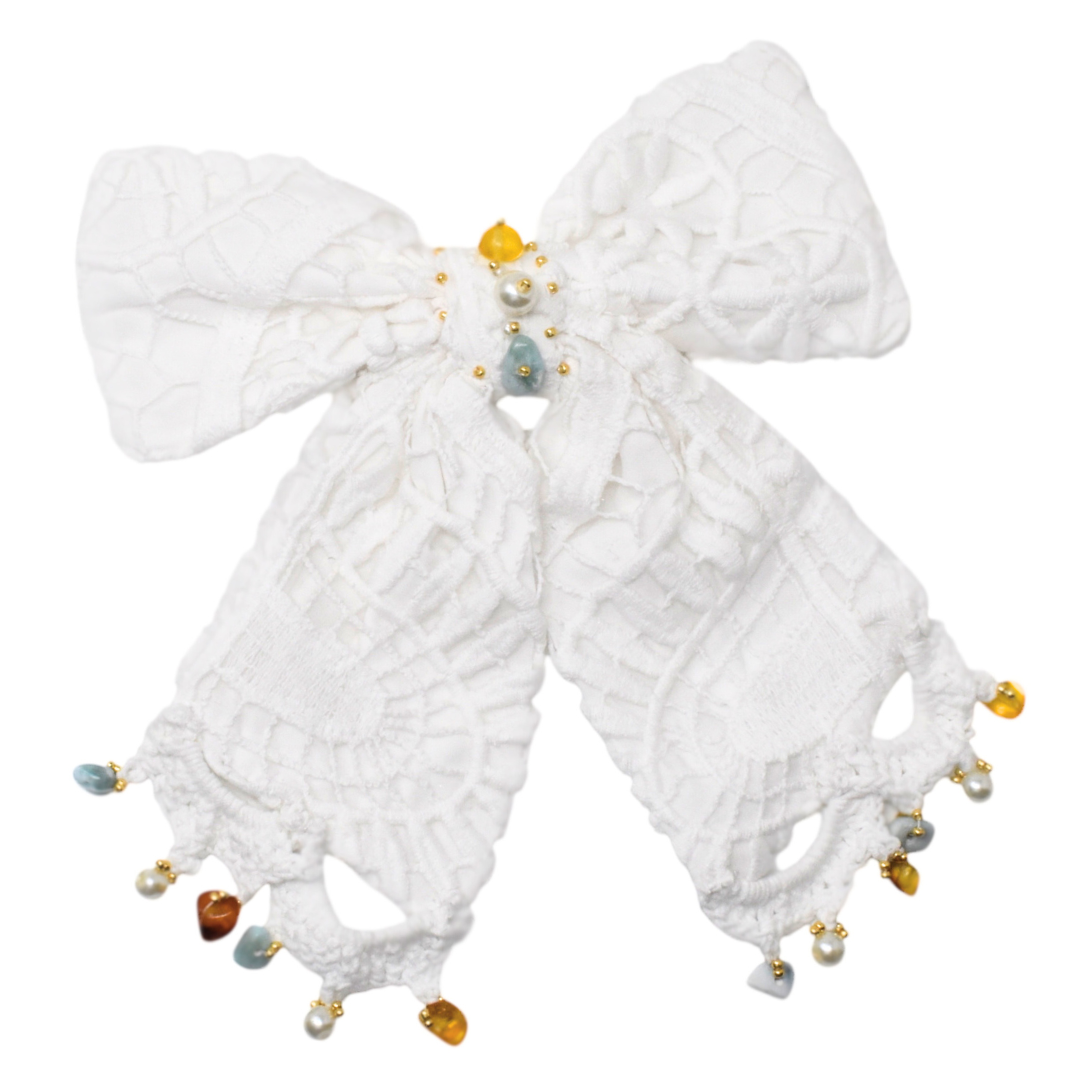 "Cayo Arena: Chic Bow"