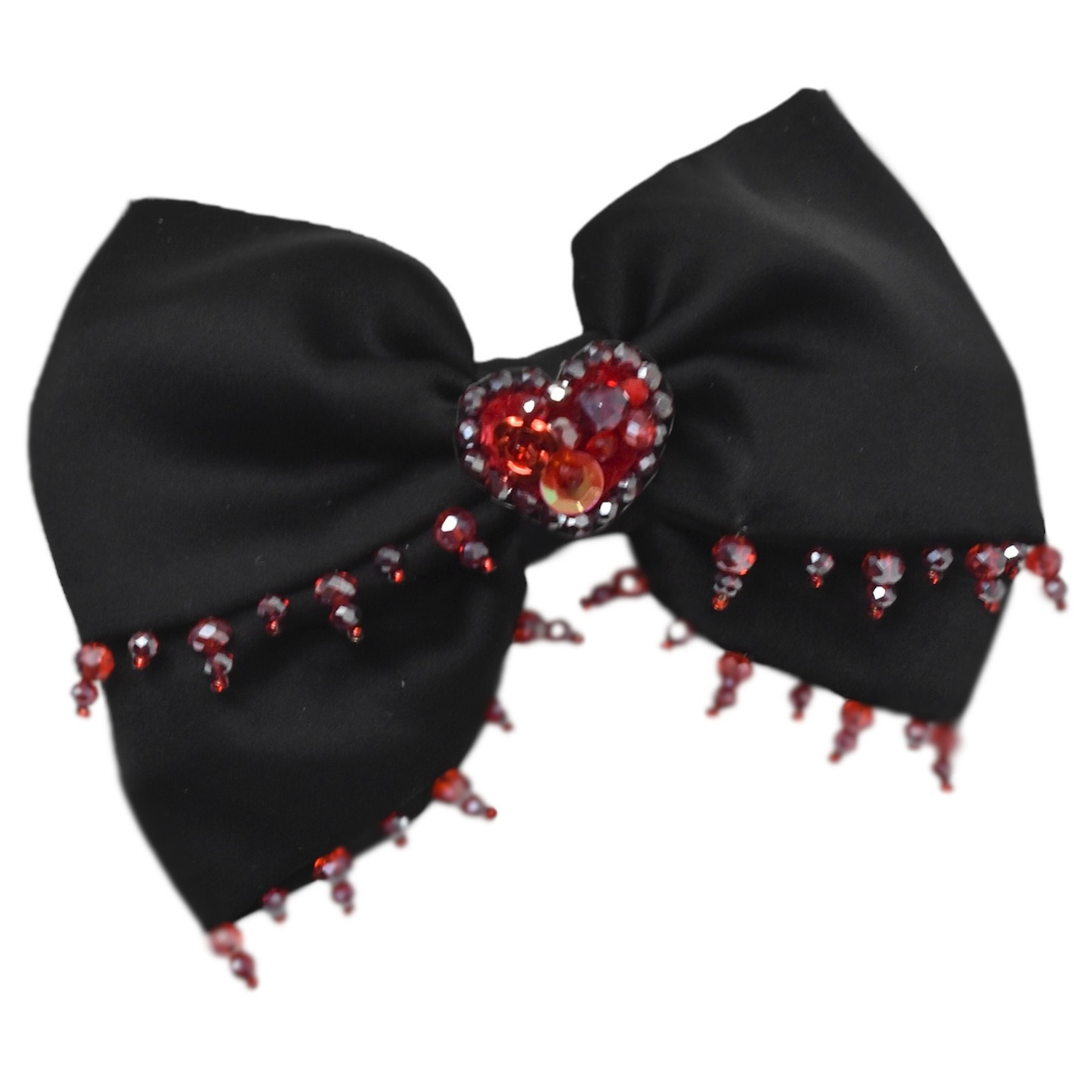 "Nuestra Canción: Black Bow"