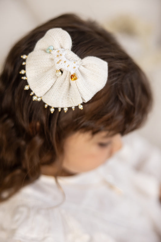 "Cayo Arena: MINI Melina Bow"