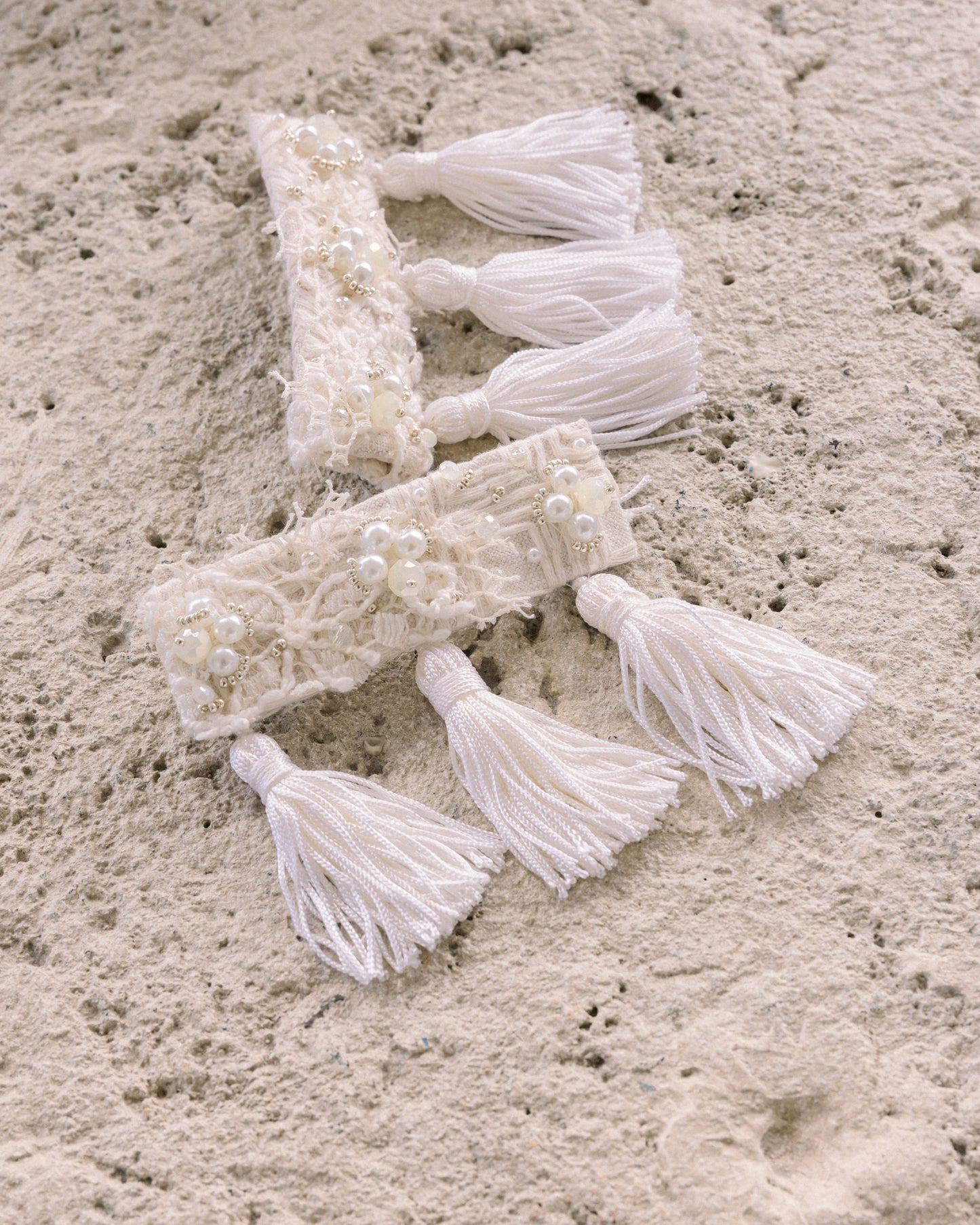 "Ivory Muse: Gancho Tassels"