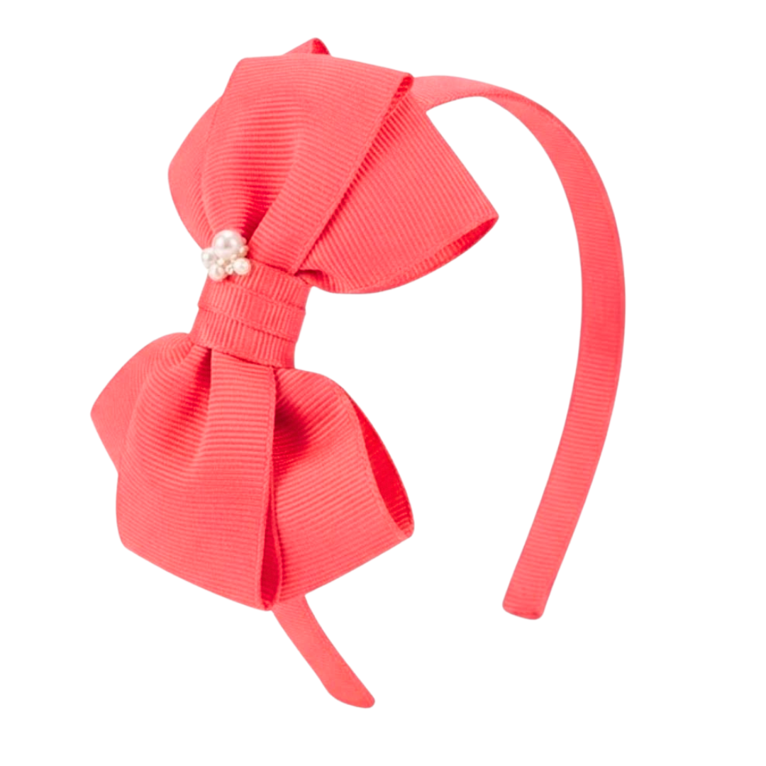 "Cintillo Laura: Coral"