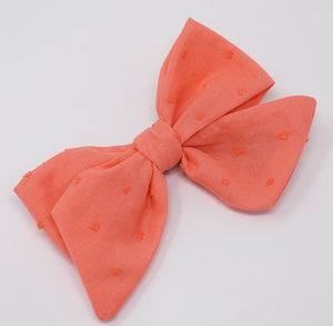 “Pixie Bow: Plumeti Coral”